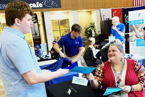 A student participates in a job fair